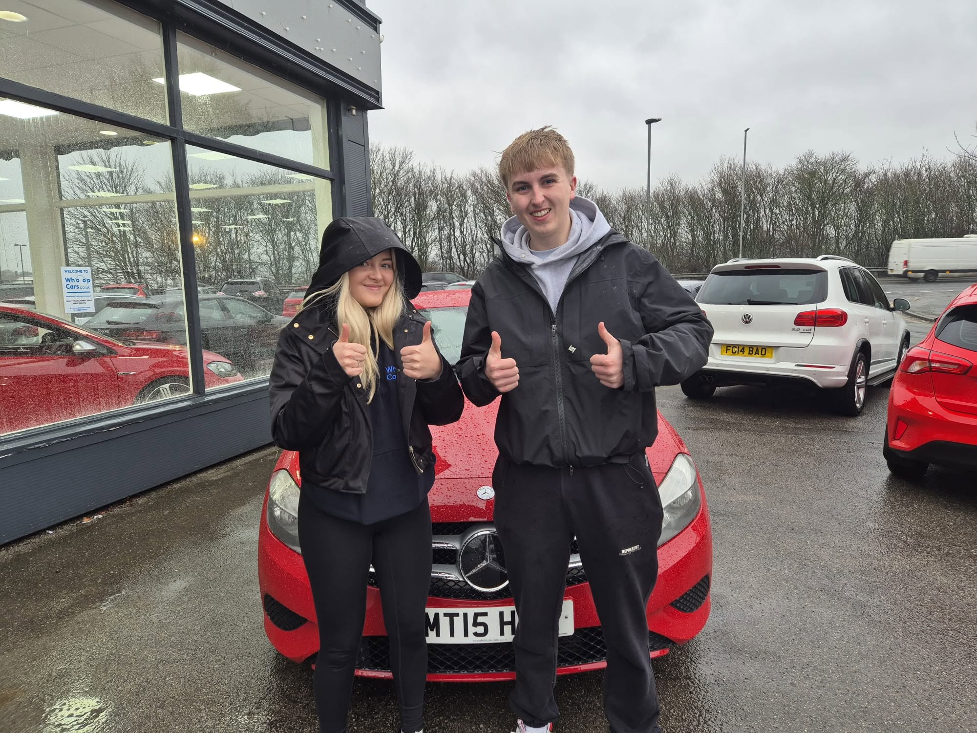 Whoop Cars customer collecting their new car 3
