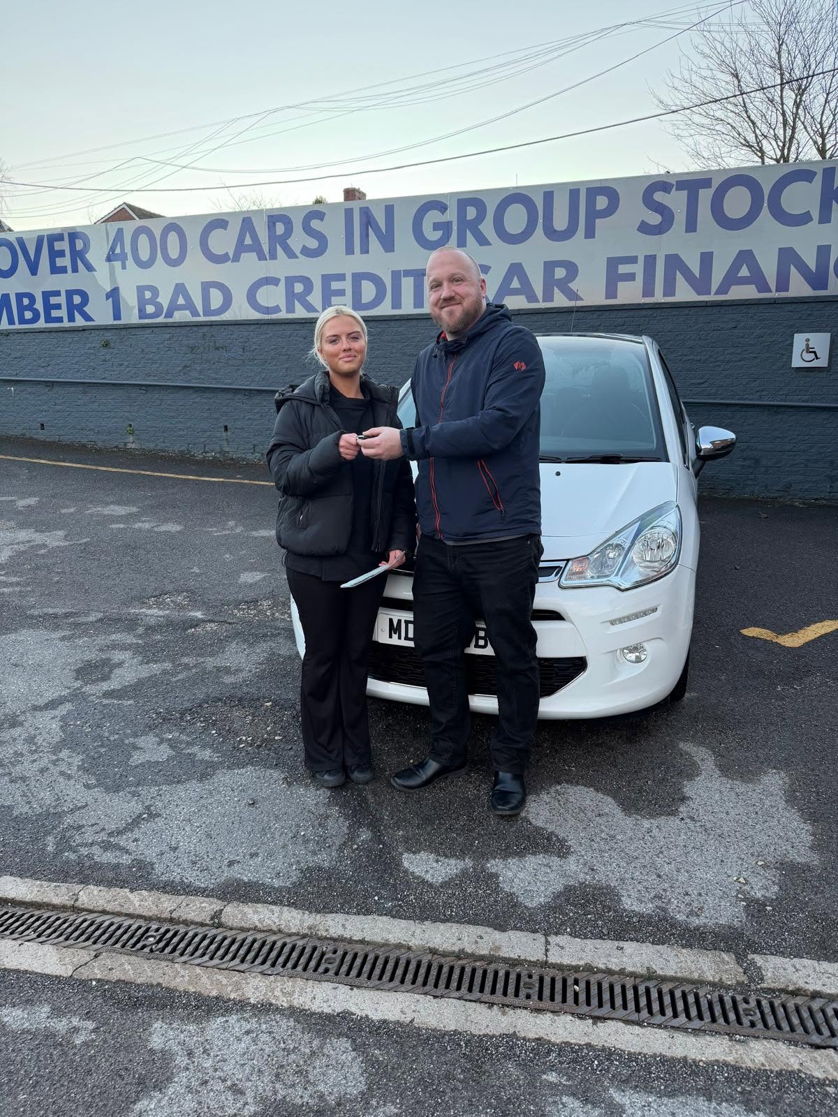 Whoop Cars customer collecting their new car 4